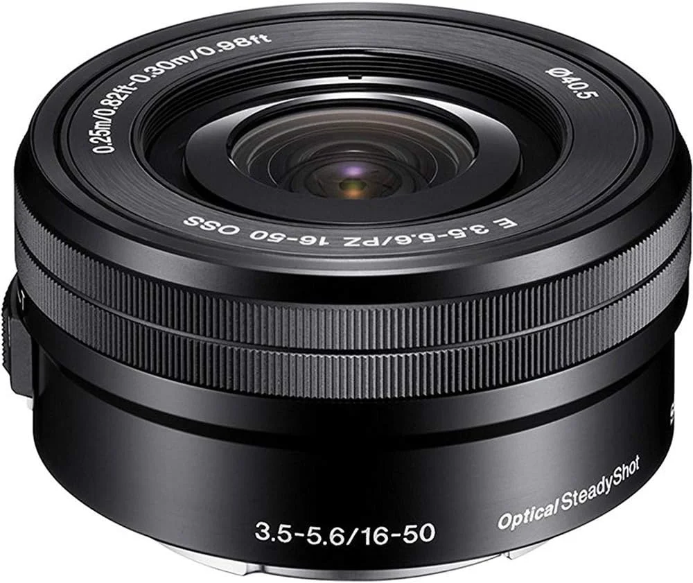 دوربین بدون آینه سونی آلفا a6700 APS-C 4K با کیت 2 لنز 16-50mm و 55-210mm مدل ILCE-6700L به همراه کیف عکاسی Deco Gear + فلاش + باتری اضافی + شارژر دوگانه + نرم افزار و کیت لوازم جانبی