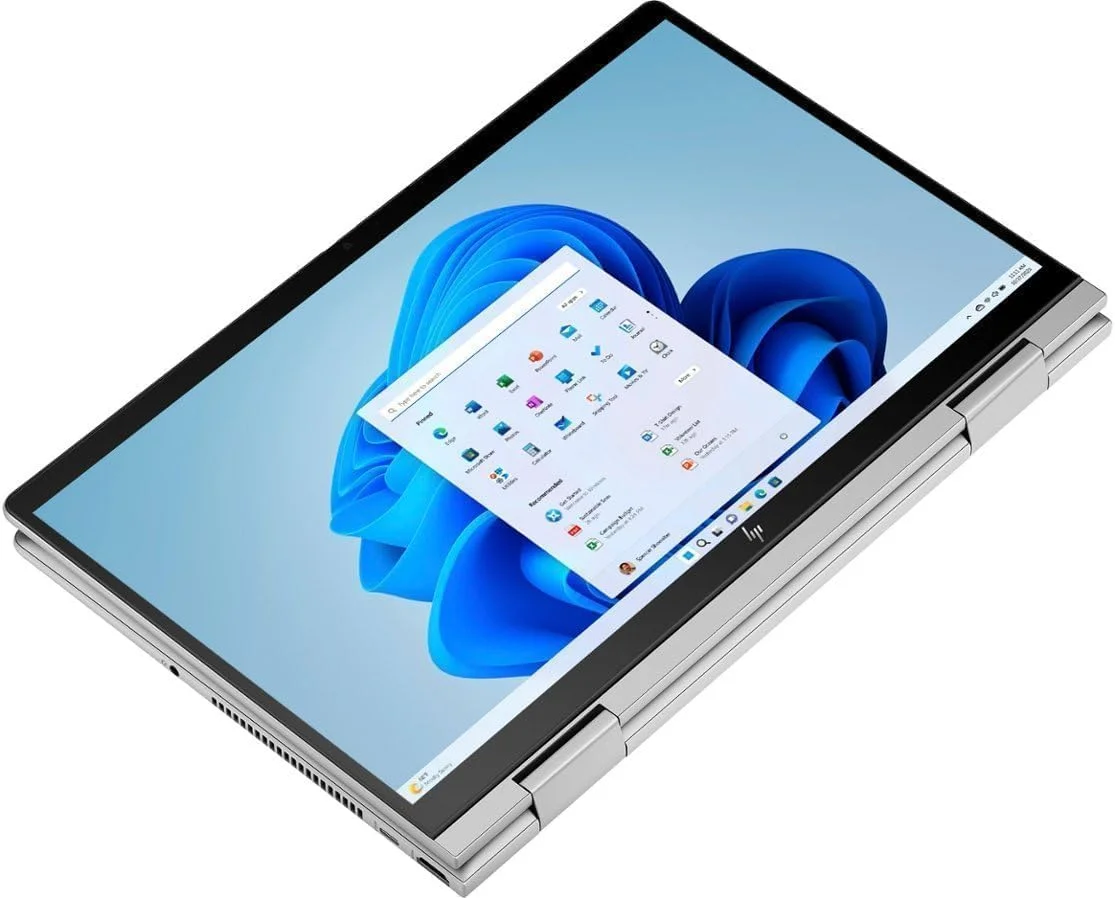 لپ تاپ 2 در 1 HP Envy x360، صفحه نمایش لمسی 14.0 اینچی FHD، پردازنده Intel Core 7 150U، رم 16 گیگابایتی، SSD 512 گیگابایتی، بلوتوث، Wi-Fi 6E، حسگر اثر انگشت، صفحه کلید با نور پس زمینه، ویندوز 11 پرو، نقره ای لپ تاپ 2 در 1 HP Envy x360، صفحه نمایش لمسی 14.0 اینچی FHD، پردازنده Intel Core 7 150U، رم 16 گیگابایتی، SSD 512 گیگابایتی، بلوتوث، Wi-Fi 6E، حسگر اثر انگشت، صفحه کلید با نور پس زمینه، ویندوز 11 پرو، نقره ای