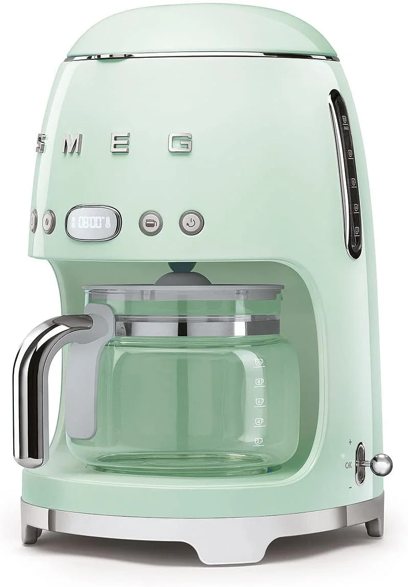 دستگاه قهوه ساز قطره ای Smeg Dcf02PgUK، ظرفیت 10 فنجان، حالت شروع خودکار، فیلتر قابل استفاده مجدد، صفحه نمایش دیجیتال، سیستم ضد چکه، گزینه شدت عطر، مخزن 1.4 لیتری، سبز پاستیلی، 1 سال گارانتی دستگاه قهوه ساز قطره ای Smeg Dcf02PgUK، ظرفیت 10 فنجان، حالت شروع خودکار، فیلتر قابل استفاده مجدد، صفحه نمایش دیجیتال، سیستم ضد چکه، گزینه شدت عطر، مخزن 1.4 لیتری، سبز پاستیلی، 1 سال گارانتی