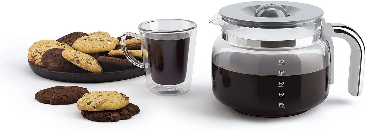 دستگاه قهوه ساز قطره ای Smeg Dcf02PgUK، ظرفیت 10 فنجان، حالت شروع خودکار، فیلتر قابل استفاده مجدد، صفحه نمایش دیجیتال، سیستم ضد چکه، گزینه شدت عطر، مخزن 1.4 لیتری، سبز پاستیلی، 1 سال گارانتی دستگاه قهوه ساز قطره ای Smeg Dcf02PgUK، ظرفیت 10 فنجان، حالت شروع خودکار، فیلتر قابل استفاده مجدد، صفحه نمایش دیجیتال، سیستم ضد چکه، گزینه شدت عطر، مخزن 1.4 لیتری، سبز پاستیلی، 1 سال گارانتی