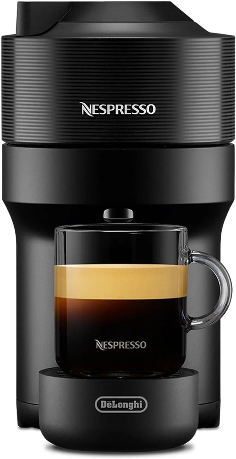 دستگاه قهوه کپسولی نسپرسو De'Longhi ENV90.BAE Vertuo Pop + کف ساز شیر Aeroccino، آماده سازی 4 سایز فنجان، فناوری Centrifusion، شامل بسته خوش آمدگویی، 1260 وات، مشکی شیرین بیان دستگاه قهوه کپسولی نسپرسو De'Longhi ENV90.BAE Vertuo Pop + کف ساز شیر Aeroccino، آماده سازی 4 سایز فنجان، فناوری Centrifusion، شامل بسته خوش آمدگویی، 1260 وات، مشکی شیرین بیان