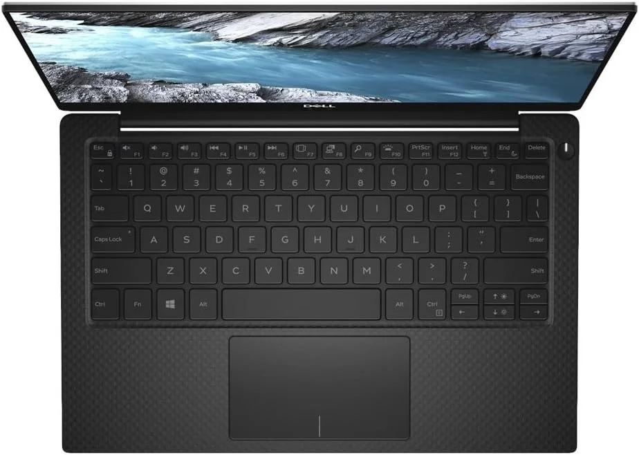 لپ تاپ دل XPS 9370-7040 با صفحه نمایش لمسی 4K HD، پردازنده Intel Core i7، صفحه نمایش 13.3 اینچی، 1 ترابایت SSD، 16 گیگابایت رم، کارت گرافیک Intel UHD 620، ویندوز 10، صفحه کلید انگلیسی، نقره ای