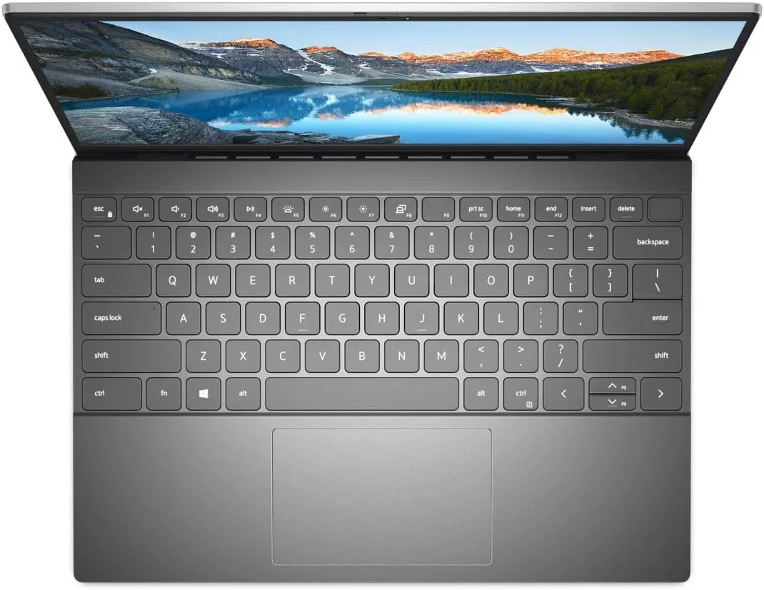 لپ تاپ Dell Inspiron 13 5310، پردازنده نسل 11 اینتل Core i5-11320H، صفحه نمایش 13.3 اینچی QHD، حافظه SSD 512 گیگابایتی، رم 8 گیگابایتی، گرافیک Intel® Iris® Xe، ویندوز 10 هوم، صفحه کلید انگلیسی عربی، نقره ای لپ تاپ Dell Inspiron 13 5310، پردازنده نسل 11 اینتل Core i5-11320H، صفحه نمایش 13.3 اینچی QHD، حافظه SSD 512 گیگابایتی، رم 8 گیگابایتی، گرافیک Intel® Iris® Xe، ویندوز 10 هوم، صفحه کلید انگلیسی عربی، نقره ای