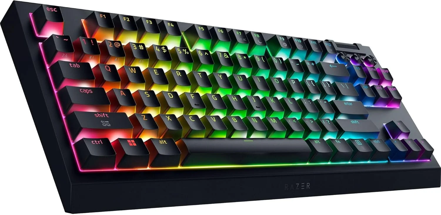 کیبورد گیمینگ بیسیم و هات سواپ ریزر BlackWidow V4 TKL HyperSpeed: سوییچهای نارنجی لمسی - بیسیم و بلوتوث - غلطک چند منظوره و دکمههای کنترلی - Chroma RGB - عمر باتری طولانی کیبورد گیمینگ بیسیم و هات سواپ ریزر BlackWidow V4 TKL HyperSpeed: سوییچهای نارنجی لمسی - بیسیم و بلوتوث - غلطک چند منظوره و دکمههای کنترلی - Chroma RGB - عمر باتری طولانی