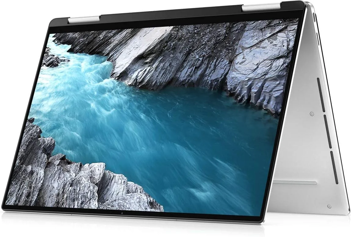 لپ تاپ فوق سبک تبدیل شونده Dell XPS 13 9310، پردازنده نسل 11 اینتل Core i7-1165G7، صفحه نمایش 13.4 اینچی FHD، حافظه SSD 512 گیگابایتی، رم 16 گیگابایتی، گرافیک Intel® Iris® Xe، ویندوز 10 هوم، کیبورد انگلیسی-عربی، نقره ای لپ تاپ فوق سبک تبدیل شونده Dell XPS 13 9310، پردازنده نسل 11 اینتل Core i7-1165G7، صفحه نمایش 13.4 اینچی FHD، حافظه SSD 512 گیگابایتی، رم 16 گیگابایتی، گرافیک Intel® Iris® Xe، ویندوز 10 هوم، کیبورد انگلیسی-عربی، نقره ای
