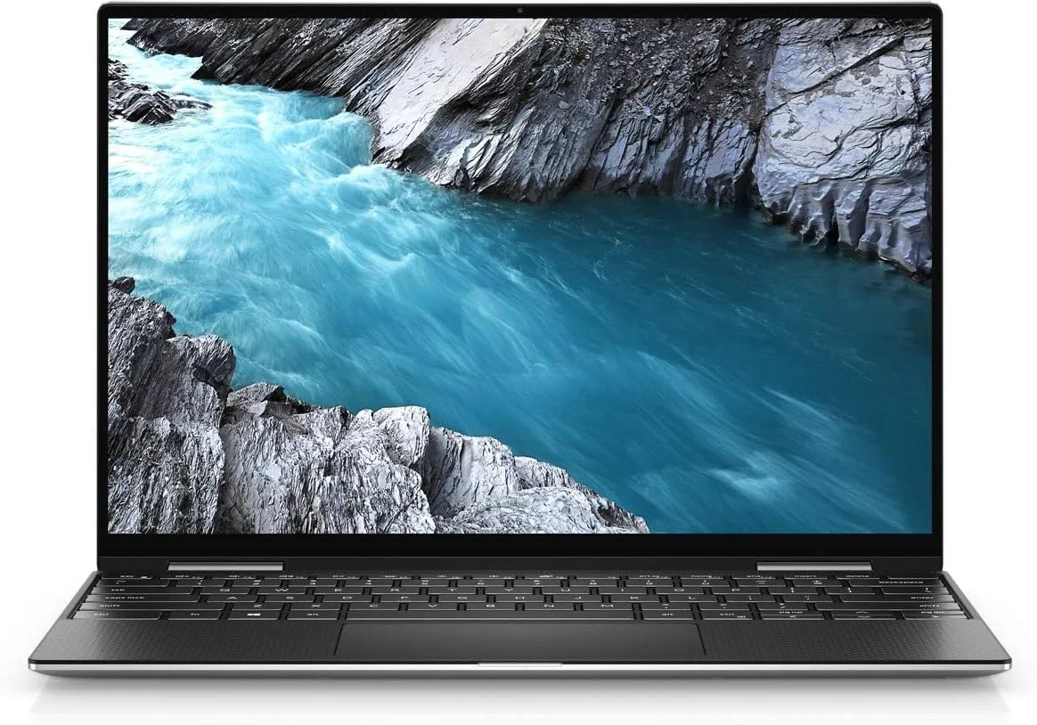 لپ تاپ فوق سبک تبدیل شونده Dell XPS 13 9310، پردازنده نسل 11 اینتل Core i7-1165G7، صفحه نمایش 13.4 اینچی FHD، حافظه SSD 512 گیگابایتی، رم 16 گیگابایتی، گرافیک Intel® Iris® Xe، ویندوز 10 هوم، کیبورد انگلیسی-عربی، نقره ای لپ تاپ فوق سبک تبدیل شونده Dell XPS 13 9310، پردازنده نسل 11 اینتل Core i7-1165G7، صفحه نمایش 13.4 اینچی FHD، حافظه SSD 512 گیگابایتی، رم 16 گیگابایتی، گرافیک Intel® Iris® Xe، ویندوز 10 هوم، کیبورد انگلیسی-عربی، نقره ای