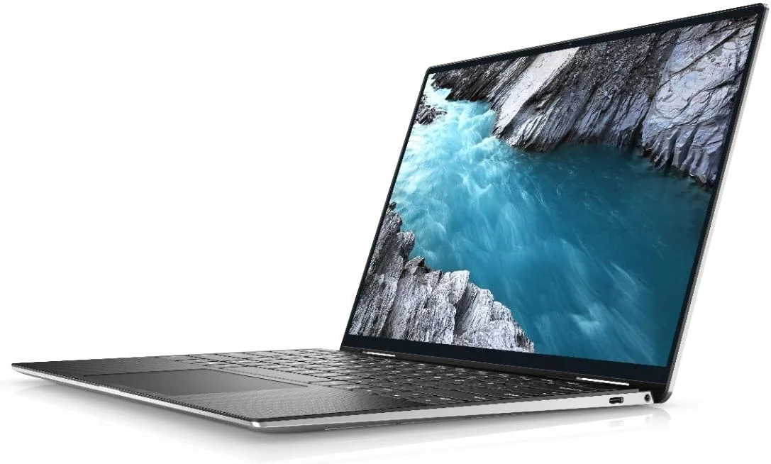 لپ تاپ فوق سبک تبدیل شونده Dell XPS 13 9310، پردازنده نسل 11 اینتل Core i7-1165G7، صفحه نمایش 13.4 اینچی FHD، حافظه SSD 512 گیگابایتی، رم 16 گیگابایتی، گرافیک Intel® Iris® Xe، ویندوز 10 هوم، کیبورد انگلیسی-عربی، نقره ای لپ تاپ فوق سبک تبدیل شونده Dell XPS 13 9310، پردازنده نسل 11 اینتل Core i7-1165G7، صفحه نمایش 13.4 اینچی FHD، حافظه SSD 512 گیگابایتی، رم 16 گیگابایتی، گرافیک Intel® Iris® Xe، ویندوز 10 هوم، کیبورد انگلیسی-عربی، نقره ای