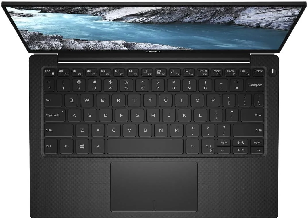 لپ تاپ باریک DELL XPS 13 (13-XPS-1250-SLR)، پردازنده Intel Core i5-8265U، صفحه نمایش 13.3 اینچ، 256 گیگابایت، 8 گیگابایت رم، گرافیک Intel® UHD Graphics 620، ویندوز 10، صفحه کلید انگلیسی-عربی، نقره ای لپ تاپ باریک DELL XPS 13 (13-XPS-1250-SLR)، پردازنده Intel Core i5-8265U، صفحه نمایش 13.3 اینچ، 256 گیگابایت، 8 گیگابایت رم، گرافیک Intel® UHD Graphics 620، ویندوز 10، صفحه کلید انگلیسی-عربی، نقره ای