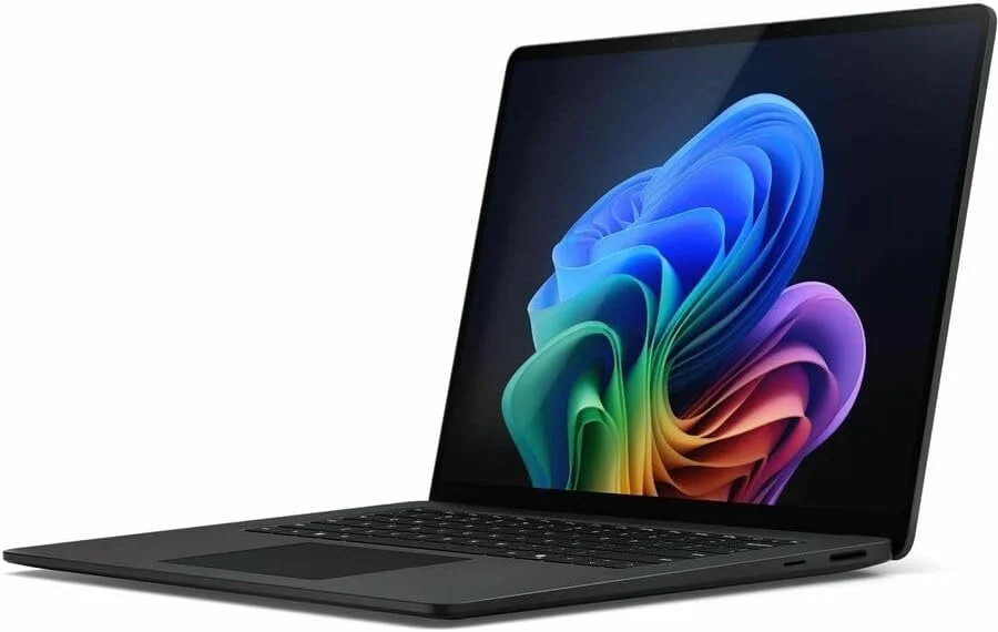 لپ تاپ مایکروسافت Surface 7 با صفحه لمسی 15 اینچی Copilot+ PC - پردازنده Qualcomm Snapdragon X Elite - رم 16 گیگابایت - حافظه SSD 1 ترابایت - کیبورد انگلیسی، فرانسوی - گرافیت