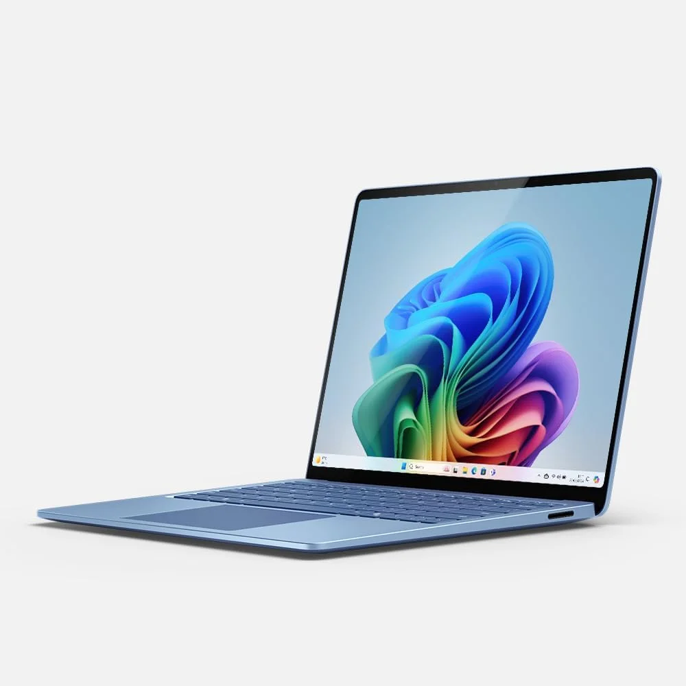 لپ تاپ مایکروسافت Surface (نسل هفتم) 2024 | Copilot+ PC | لپ تاپ لمسی 13.8 اینچی | Snapdragon® X Elite (12 هسته ای) | ویندوز 11 هوم | نسخه انگلستان (آبی، 1 ترابایت SSD + 16 گیگابایت رم)