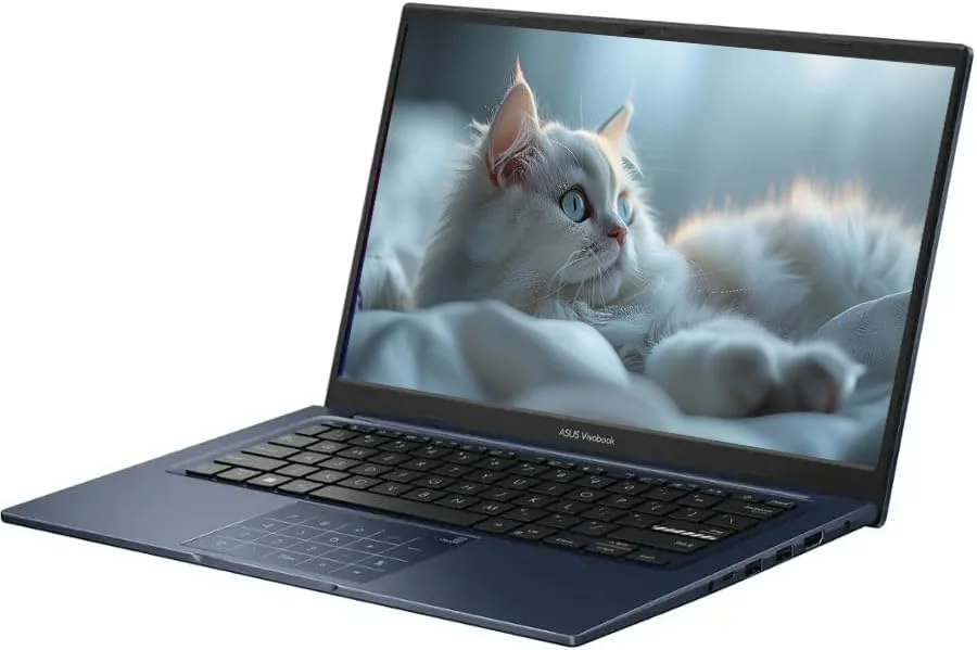 لپ تاپ باریک 14 اینچی ASUS Vivobook 14 (2025)، FHD، پردازنده Intel Core i5-1334U نسل 13، گرافیک UHD، دوربین حریم خصوصی، بلوتوث 5.1، ویندوز 11 H، آبی آرام، با HDMI (16 گیگابایت رم | 2 ترابایت SSD)