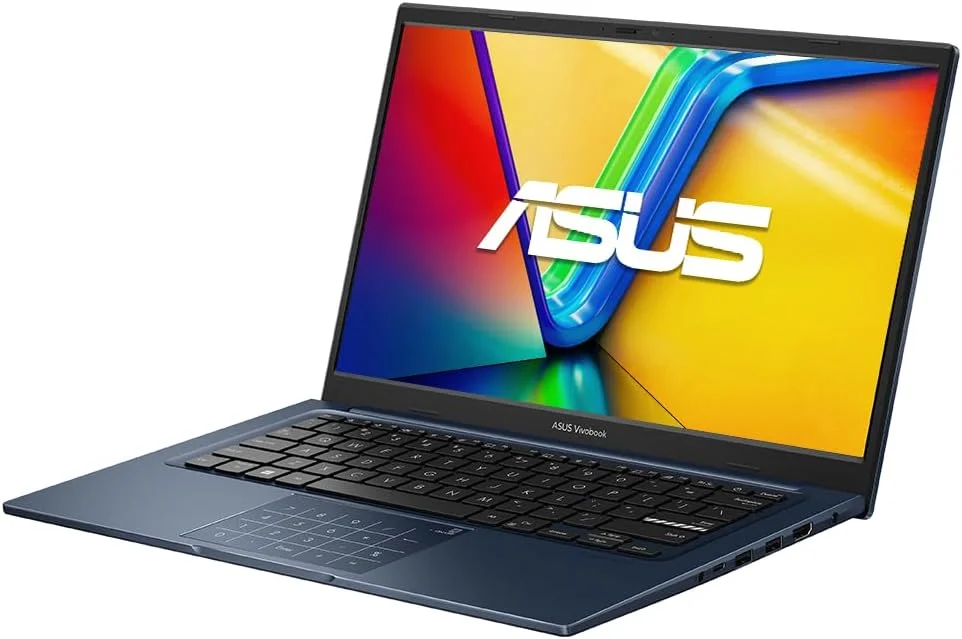 لپ تاپ 14 اینچی FHD ایسوس Vivobook 2025، پردازنده 10 هسته ای Intel Core i5-1334U، گرافیک Iris Xe، رم 12 گیگابایتی DDR4، حافظه SSD NVMe 256 گیگابایتی، USB-C با DP، WiFi AC، BT، وب کم، HDMI 1.4، ویندوز 11 هوم با USB رایگان