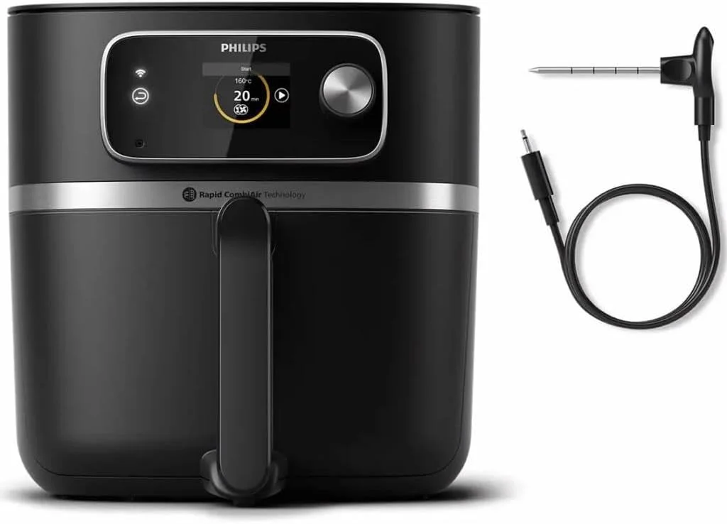 سرخ کن بدون روغن فیلیپس Versuni HD9880/90 سری 7000 XXL متصل با دماسنج غذا ظرفیت 2 کیلوگرم 8.3 لیتر مشکی سرخ کن بدون روغن فیلیپس Versuni HD9880/90 سری 7000 XXL متصل با دماسنج غذا ظرفیت 2 کیلوگرم 8.3 لیتر مشکی