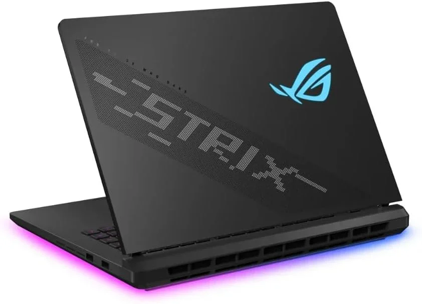 لپ تاپ گیمینگ 16 اینچی ایسوس ROG Strix، نمایشگر 16 اینچی WUXGA 165 هرتز، پردازنده Intel Core Ultra 9 275HX، رم 32 گیگابایتی DDR5، حافظه SSD 1 ترابایتی PCIe 4.0، کارت گرافیک NVIDIA GeForce RTX 5070 8GB GDDR7، کیبورد RGB انگلیسی/عربی، ویندوز 11، سبز ولت لپ تاپ گیمینگ 16 اینچی ایسوس ROG Strix، نمایشگر 16 اینچی WUXGA 165 هرتز، پردازنده Intel Core Ultra 9 275HX، رم 32 گیگابایتی DDR5، حافظه SSD 1 ترابایتی PCIe 4.0، کارت گرافیک NVIDIA GeForce RTX 5070 8GB GDDR7، کیبورد RGB انگلیسی/عربی، ویندوز 11، سبز ولت