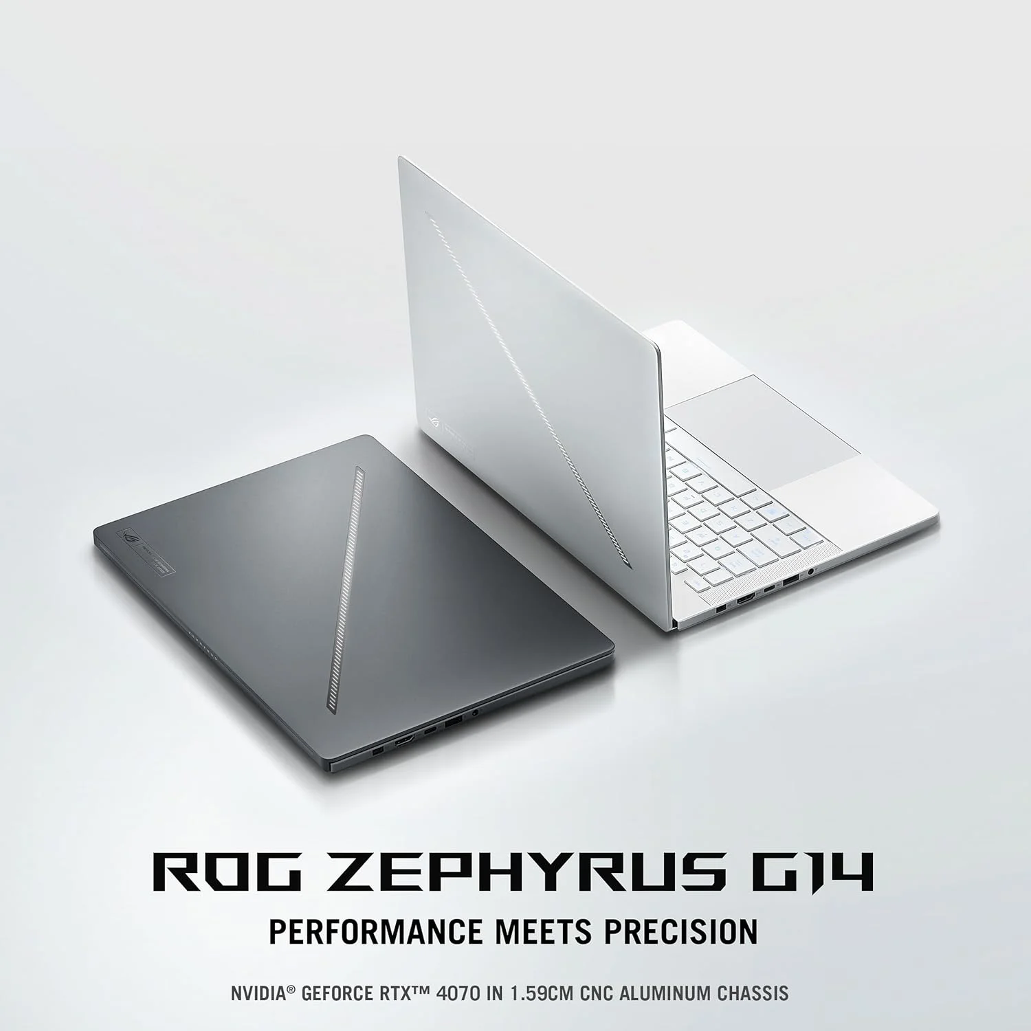 لپ تاپ گیمینگ ایسوس ROG Zephyrus G14 GA403UI-OLED7WPW سفید پلاتینی، پردازنده R7-7 8845HS، رم 16 گیگابایت، حافظه SSD 1 ترابایت PCIe 4.0 M.2، کارت گرافیک RTX 4070 با 8 گیگابایت VRAM، ویندوز 11 پرو، صفحه نمایش 14 اینچ 3K 16:10 129 هرتز، کیبورد با نور پس زمینه RGB انگلیسی-عربی