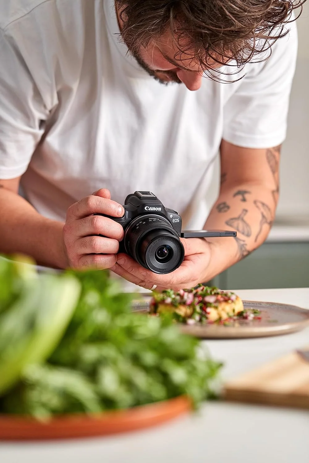 دوربین بدون آینه کانن EOS R50، مشکی + لنز RF-S 18-45mm F4.5-6.3 IS STM (مدل ارتقا یافته M50 Mark II)
