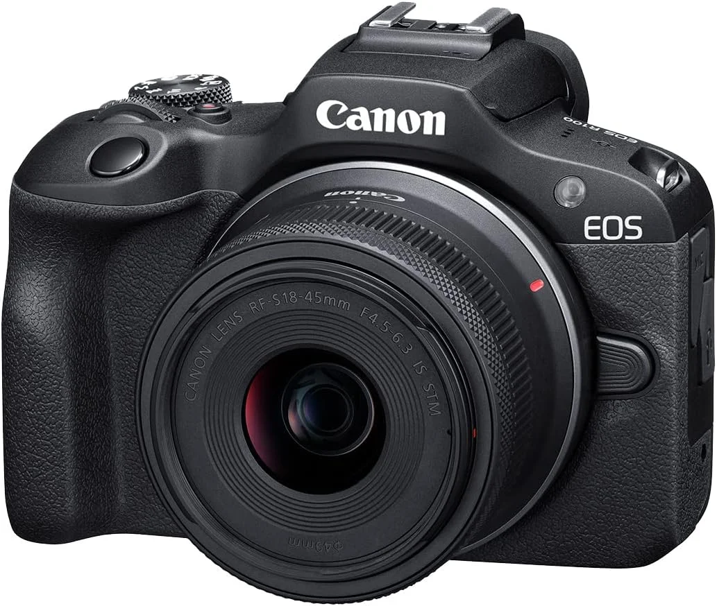 کیت دوربین بدون آینه Canon EOS R100 با لنزهای RF-S18-45mm F4.5-6.3 is STM و RF-S55-210mm F5-7.1 is STM، مانت RF، 24.1 مگاپیکسل، عکاسی پیوسته، فیلمبرداری Full HD و 4K، سبک وزن، Wi-Fi، مناسب تولید محتوا