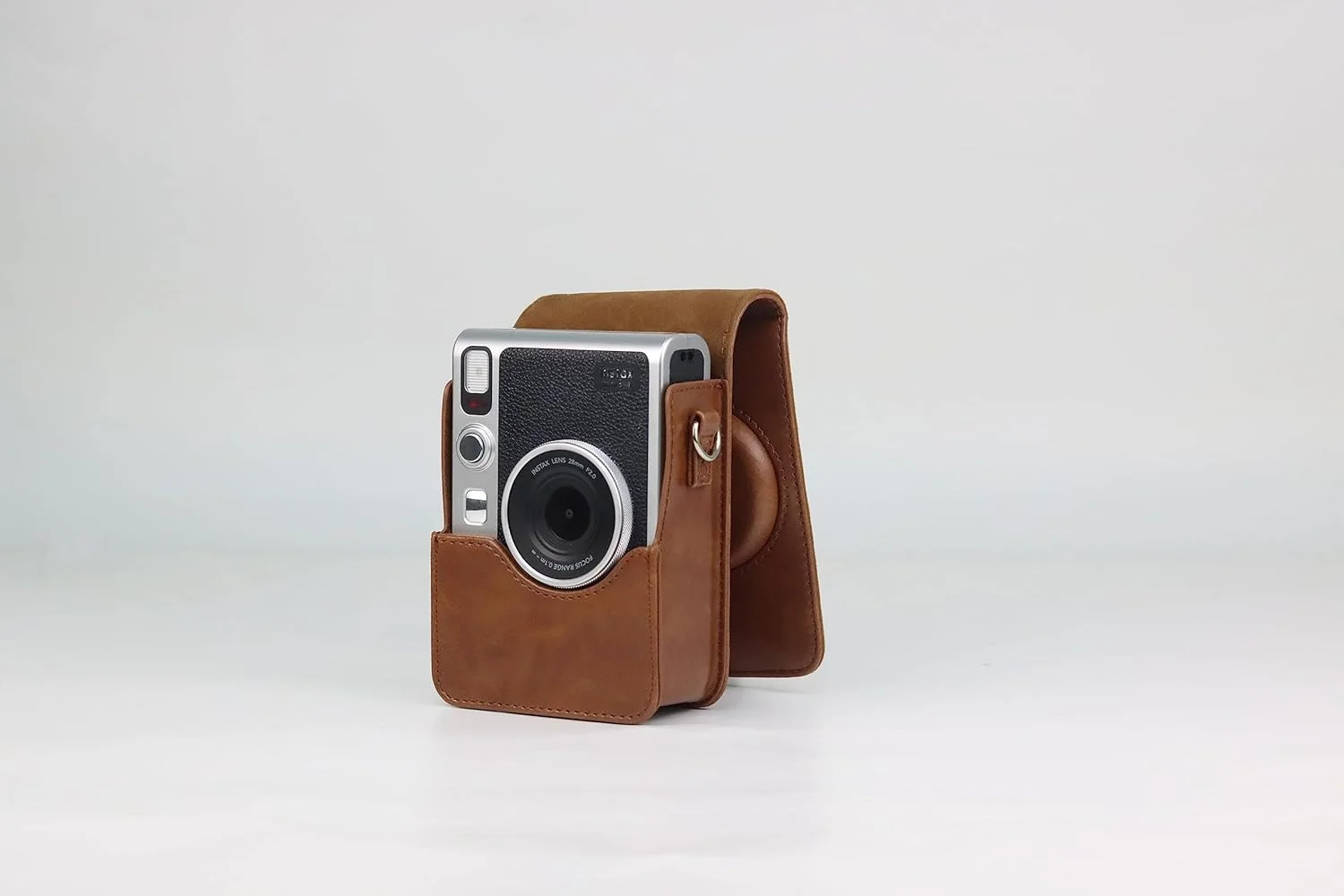 دوربین چاپ سریع هیبریدی فوجی فیلم Instax Mini EVO قهوه ای | فیلم فوری تک بسته ای فوجی Instax Mini | کارت حافظه microSD 32 گیگابایتی | کیف دوربین - بسته نرم افزاری