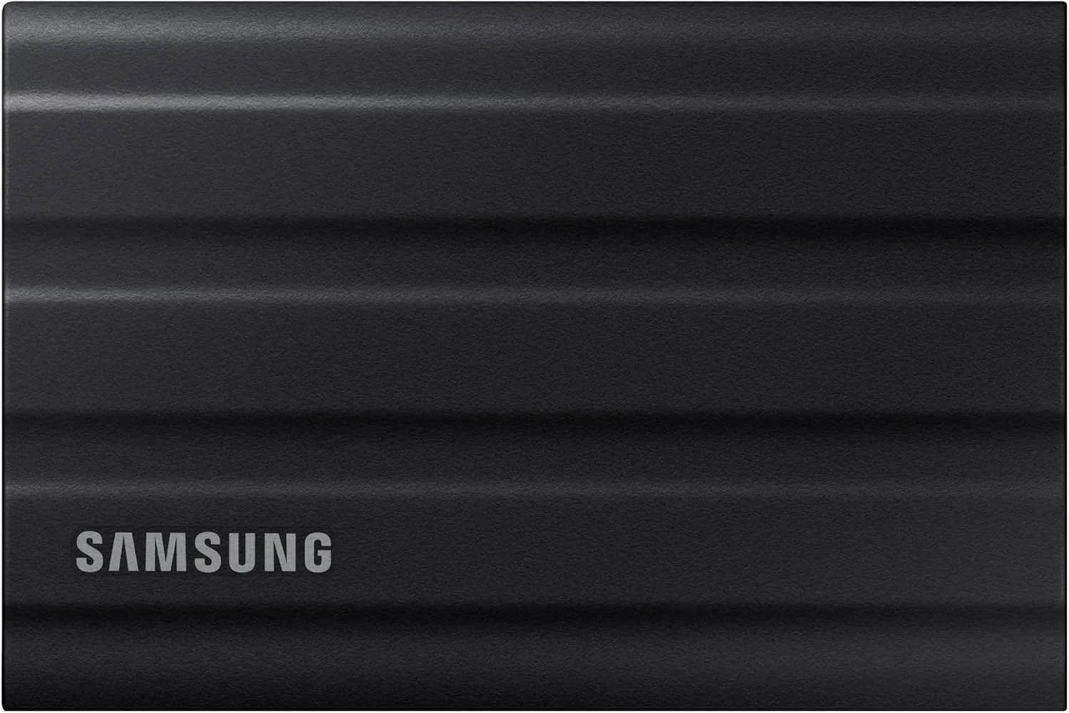 حافظه اس اس دی اکسترنال قابل حمل سامسونگ مدل T7 Shield با ظرفیت 4 ترابایت، USB 3.2 Gen2، مشکی، سرعت تا 1050 مگابایت بر ثانیه، مقاوم، دارای استاندارد IP65 مقاوم در برابر آب و گرد و غبار، مناسب برای عکاسان، تولیدکنندگان محتوا و گیمینگ، سازگار با مک، MU-PE4T0S