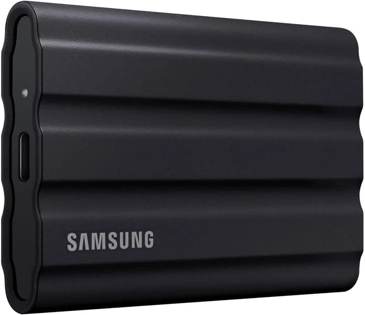 درایو حالت جامد قابل حمل سامسونگ T7 Shield USB 3.2 با ظرفیت 1 ترابایت، مقاوم در برابر آب IP65، SSD اکسترنال سازگار با PC/Mac/Android/کنسول های بازی، مدل MU-PE1T0S/WW، سال 2023، مشکی درایو حالت جامد قابل حمل سامسونگ T7 Shield USB 3.2 با ظرفیت 1 ترابایت، مقاوم در برابر آب IP65، SSD اکسترنال سازگار با PC/Mac/Android/کنسول های بازی، مدل MU-PE1T0S/WW، سال 2023، مشکی