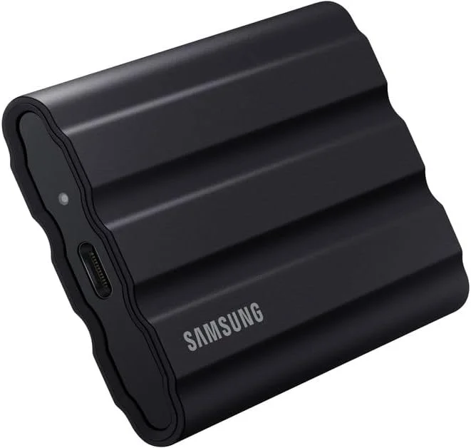 درایو حالت جامد قابل حمل سامسونگ T7 Shield USB 3.2 با ظرفیت 1 ترابایت، مقاوم در برابر آب IP65، SSD اکسترنال سازگار با PC/Mac/Android/کنسول های بازی، مدل MU-PE1T0S/WW، سال 2023، مشکی درایو حالت جامد قابل حمل سامسونگ T7 Shield USB 3.2 با ظرفیت 1 ترابایت، مقاوم در برابر آب IP65، SSD اکسترنال سازگار با PC/Mac/Android/کنسول های بازی، مدل MU-PE1T0S/WW، سال 2023، مشکی