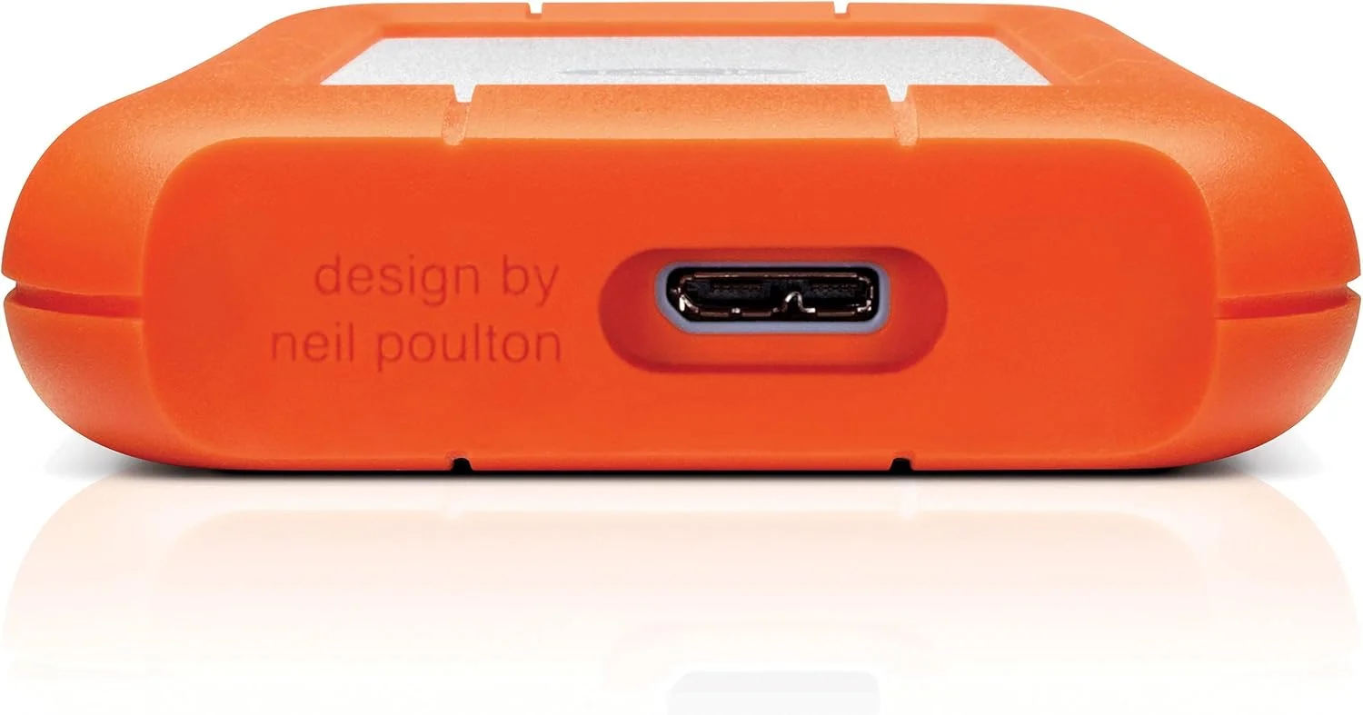 هارد اکسترنال قابل حمل LaCie Rugged Mini با ظرفیت 1 ترابایت، سایز 2.5 اینچ، مناسب برای PC و Mac، مقاوم در برابر ضربه، سقوط و فشار، دارای 2 سال خدمات بازیابی اطلاعات (LAC301558)
