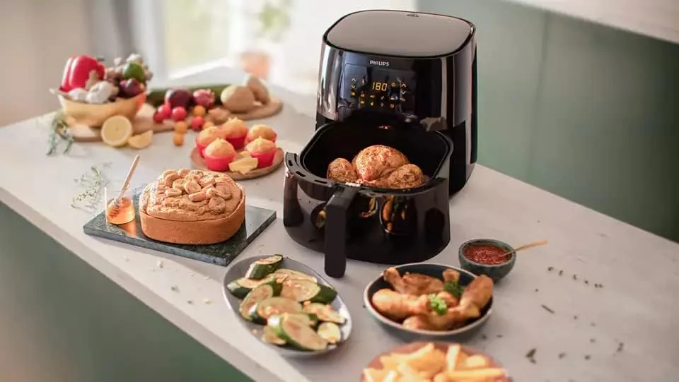 سرخ کن بدون روغن فیلیپس مدل Essential Airfryer XL - ظرفیت 6.2 لیتر، فناوری هوای داغ Rapid Air، صفحه لمسی، اپلیکیشن NutriU با دستور پخت، 2000 وات، 15x15x14 سانتی متر، مشکی (HD9270/90) سرخ کن بدون روغن فیلیپس مدل Essential Airfryer XL - ظرفیت 6.2 لیتر، فناوری هوای داغ Rapid Air، صفحه لمسی، اپلیکیشن NutriU با دستور پخت، 2000 وات، 15x15x14 سانتی متر، مشکی (HD9270/90)