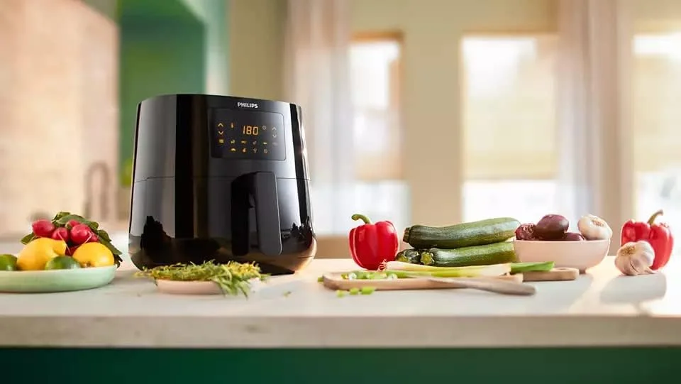 سرخ کن بدون روغن فیلیپس مدل Essential Airfryer XL - ظرفیت 6.2 لیتر، فناوری هوای داغ Rapid Air، صفحه لمسی، اپلیکیشن NutriU با دستور پخت، 2000 وات، 15x15x14 سانتی متر، مشکی (HD9270/90) سرخ کن بدون روغن فیلیپس مدل Essential Airfryer XL - ظرفیت 6.2 لیتر، فناوری هوای داغ Rapid Air، صفحه لمسی، اپلیکیشن NutriU با دستور پخت، 2000 وات، 15x15x14 سانتی متر، مشکی (HD9270/90)