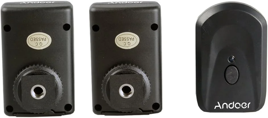 ست فلاش تریگر بیسیم 4 کاناله Andoer PT-04GY یونیورسال شامل 1 فرستنده و 2 گیرنده برای Canon Nikon Pentax Olympus ست فلاش تریگر بیسیم 4 کاناله Andoer PT-04GY یونیورسال شامل 1 فرستنده و 2 گیرنده برای Canon Nikon Pentax Olympus