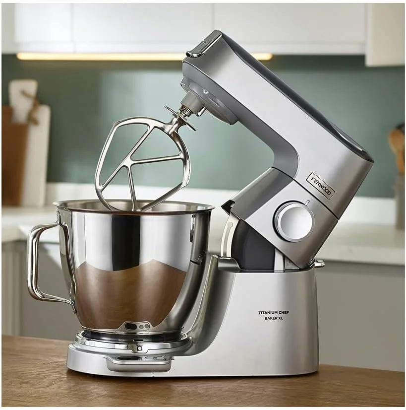 غذاساز کنوود Titanium Chef Baker XL با همزن، خمیرزن، میله و کاسه، 6.7 لیتر، مدل KVL85.424SI، توان 1500 وات، نقره ای غذاساز کنوود Titanium Chef Baker XL با همزن، خمیرزن، میله و کاسه، 6.7 لیتر، مدل KVL85.424SI، توان 1500 وات، نقره ای