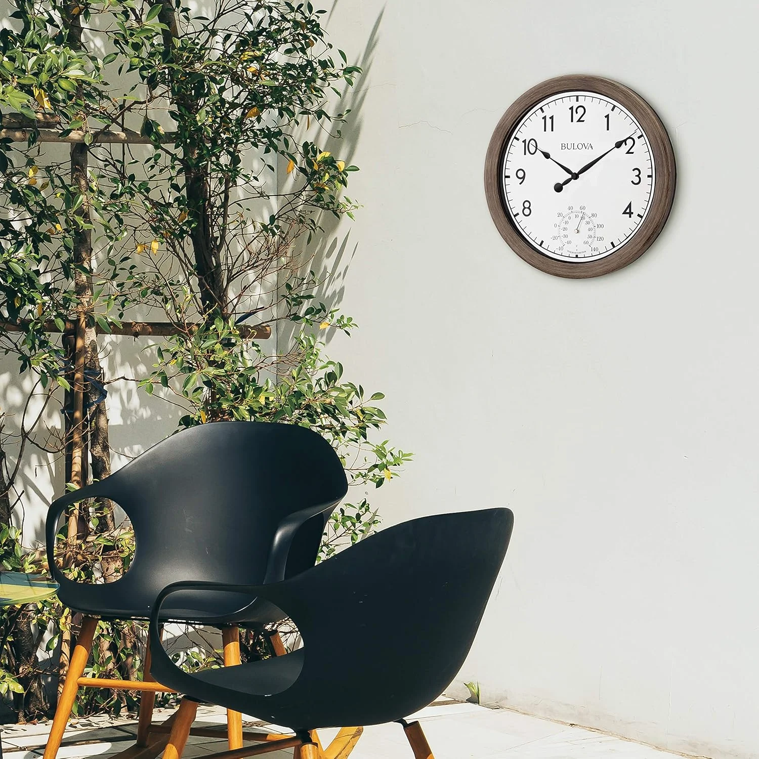 ساعت دیواری داخلی/خارجی بولوا مدل Patio Time، سایز 10.25 اینچ، با روکش راتان ساعت دیواری داخلی/خارجی بولوا مدل Patio Time، سایز 10.25 اینچ، با روکش راتان