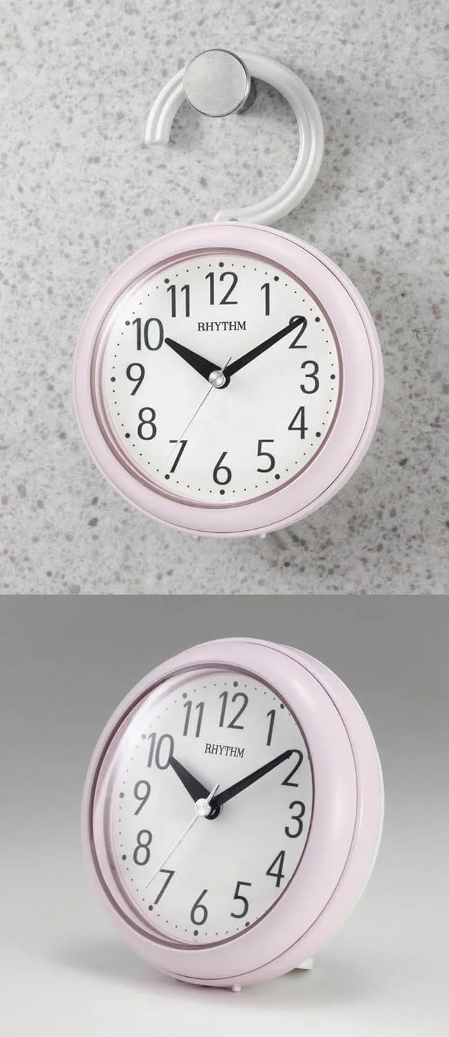 ساعت دیواری ریتم – ساعت ضد بخار با ارزش افزوده به همراه قلاب و پایه، بدنه پلاستیکی صورتی، قطر 11.8 سانتی متر (مدل 4KG711WR13)