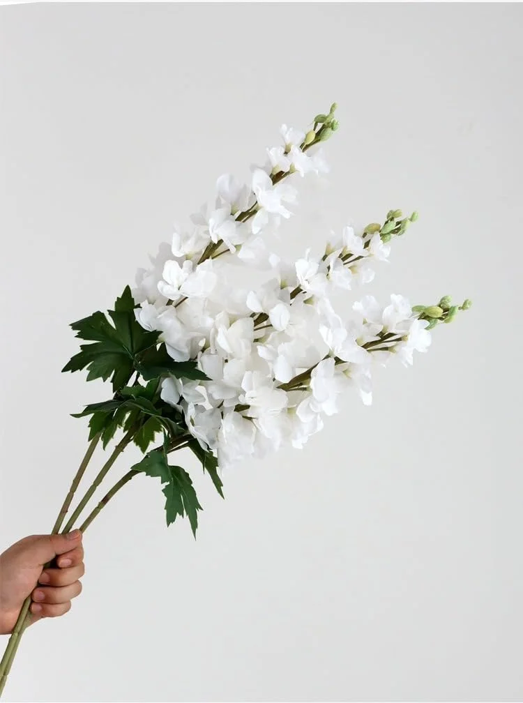 شاخه گل مصنوعی دلفینیوم، شکوفه های سفید با برگ های سبز، شاخه گل تزئینی 1 عددی (سفید) شاخه گل مصنوعی دلفینیوم، شکوفه های سفید با برگ های سبز، شاخه گل تزئینی 1 عددی (سفید)