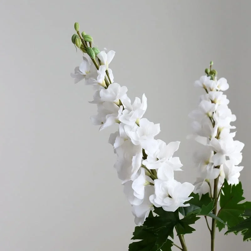 شاخه گل مصنوعی دلفینیوم، شکوفه های سفید با برگ های سبز، شاخه گل تزئینی 1 عددی (سفید) شاخه گل مصنوعی دلفینیوم، شکوفه های سفید با برگ های سبز، شاخه گل تزئینی 1 عددی (سفید)