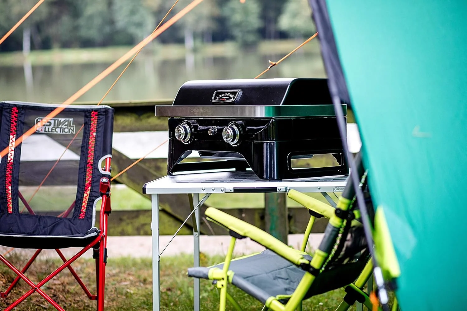 باربیکیو گازی قابل حمل Campingaz Attitude 2100 Lx، رومیزی، 2 مشعل استیل، توان 5 کیلو وات، دارای درب، دماسنج، توری گریل و پلانچا، مشکی "حداقل 1 سال گارانتی تولید کننده" باربیکیو گازی قابل حمل Campingaz Attitude 2100 Lx، رومیزی، 2 مشعل استیل، توان 5 کیلو وات، دارای درب، دماسنج، توری گریل و پلانچا، مشکی "حداقل 1 سال گارانتی تولید کننده"