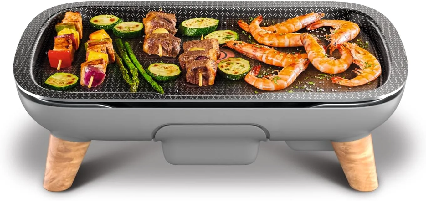 گریل برقی تفال مدل Plancha | Des Saveurs Gourmet | توان 2400 وات | پوشش نچسب Titanium Force | مناسب برای 8 نفر | ترموستات قابل تنظیم | قطعات قابل شستشو در ماشین ظرفشویی | 2 سال گارانتی | CB658P27
