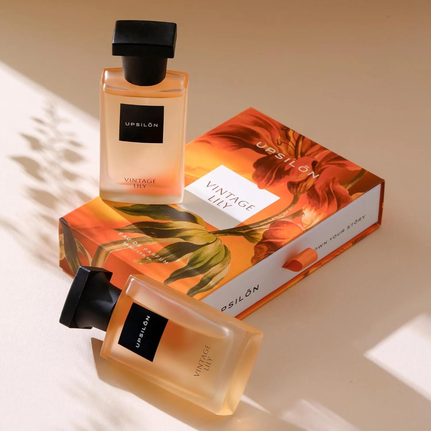 ادو پرفیوم زنانه یوپسیلون مدل Vintage Lily | عطر ممتاز با ماندگاری طولانی، رایحه ای تازه و قوی، اسپری عطر لوکس مناسب سفر | عطر زنانه | رایحه ادو پرفیوم | 50 میلی لیتر - بسته 1 عددی ادو پرفیوم زنانه یوپسیلون مدل Vintage Lily | عطر ممتاز با ماندگاری طولانی، رایحه ای تازه و قوی، اسپری عطر لوکس مناسب سفر | عطر زنانه | رایحه ادو پرفیوم | 50 میلی لیتر - بسته 1 عددی