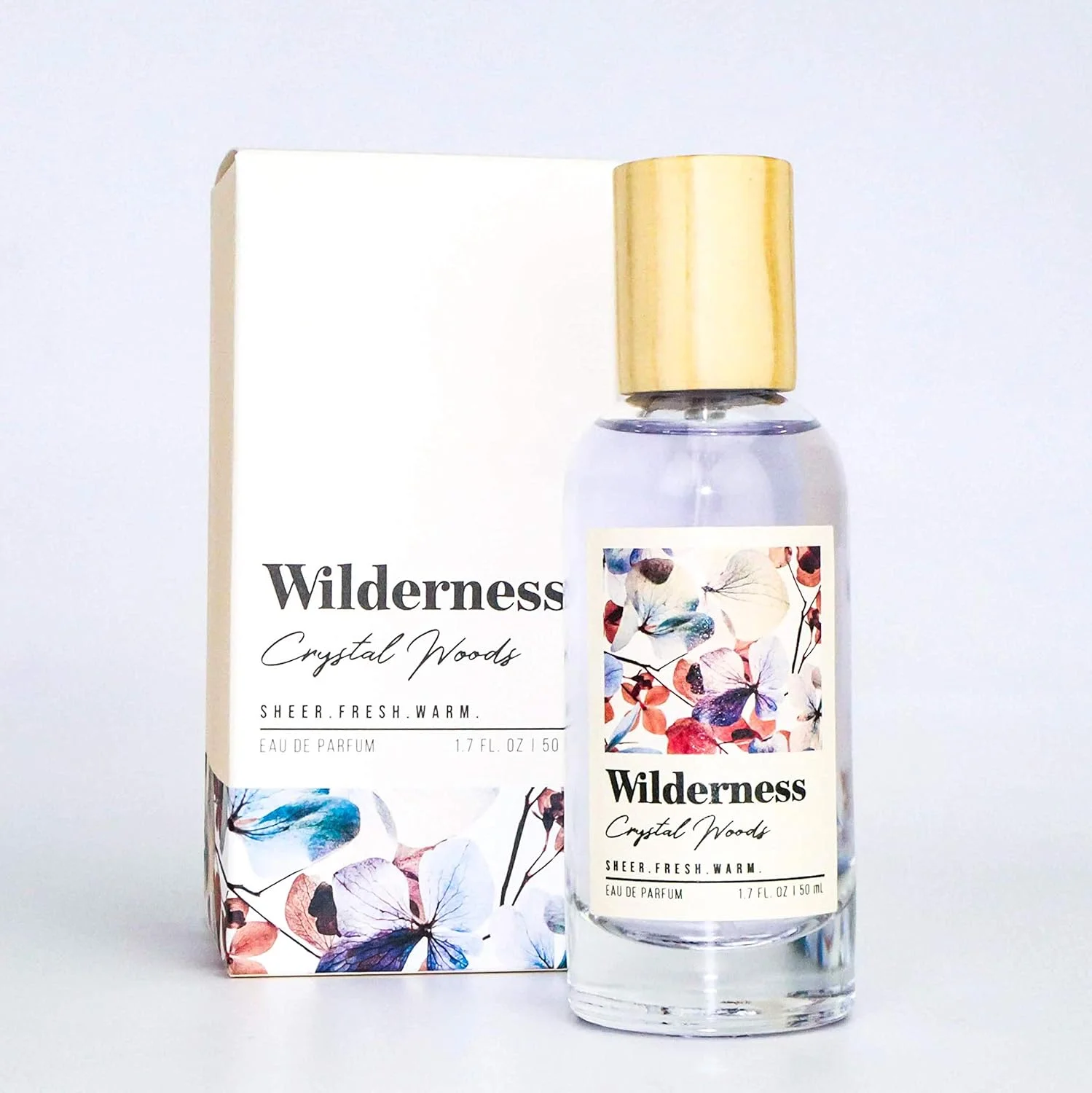 ادو پرفیوم زنانه Tru Fragrance Beauty & Wilderness Crystal Woods - رایحه گلی تازه و گرم - شکوفه های اکالیپتوس، گلبرگ های یاس، رایحه سدر شفاف - 50 میلی لیتر