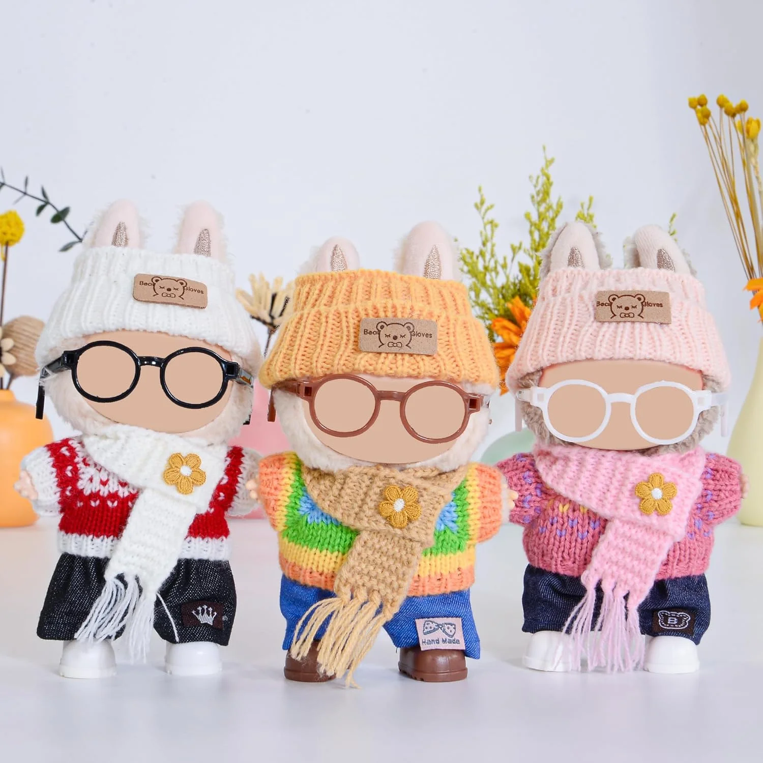 dollbie مجموعه 3 عددی لباس و لوازم جانبی بافتنی عروسک برای عروسک های 17 سانتی متری شامل: 3 کلاه، 3 ژاکت، 3 شلوار، 3 شال گردن، 3 کفش و 3 عینک (عروسک شامل نمی شود) dollbie مجموعه 3 عددی لباس و لوازم جانبی بافتنی عروسک برای عروسک های 17 سانتی متری شامل: 3 کلاه، 3 ژاکت، 3 شلوار، 3 شال گردن، 3 کفش و 3 عینک (عروسک شامل نمی شود)