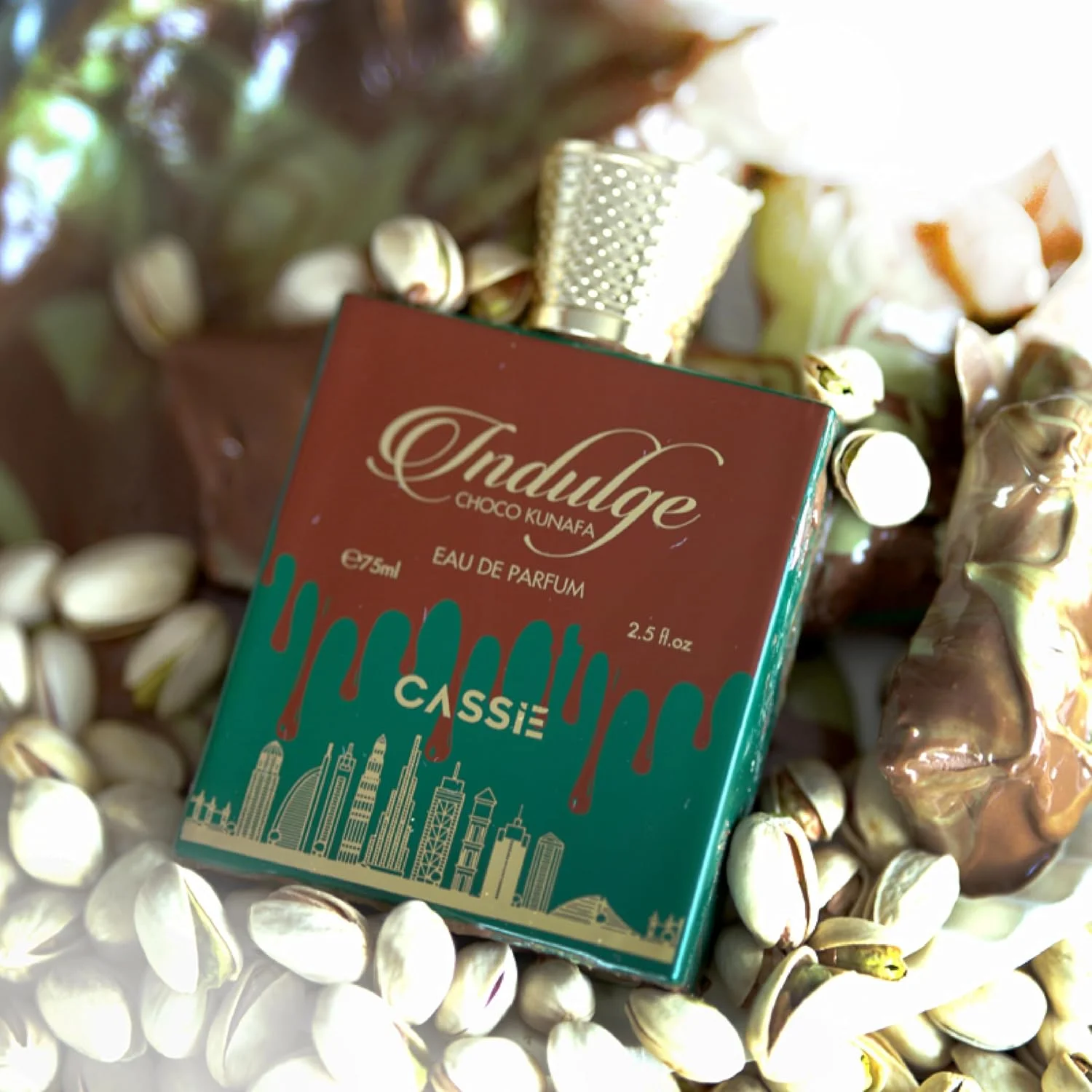 ادو پرفیوم ایندالج شکلات کنافه از Cassie – 75 میلی لیتر | عطر گورمند ماندگار با رایحه های شکلات تلخ، خامه زده شده، وانیل و پسته | عطر یونیسکس ادو پرفیوم ایندالج شکلات کنافه از Cassie – 75 میلی لیتر | عطر گورمند ماندگار با رایحه های شکلات تلخ، خامه زده شده، وانیل و پسته | عطر یونیسکس