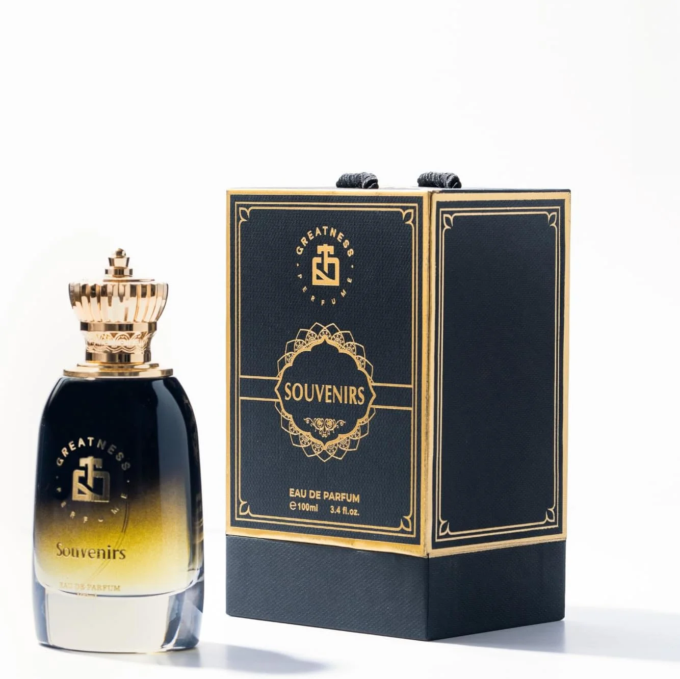 ادو پرفیوم یونی‌سکس ماندگار Greatness Souvenirs - رایحه گرم رام، هلو و زعفران - رایحه میانی سدر و دارچین - رایحه پایه وانیل، دانه تونکا و نعناع هندی - عطر لوکس 100 میلی لیتر