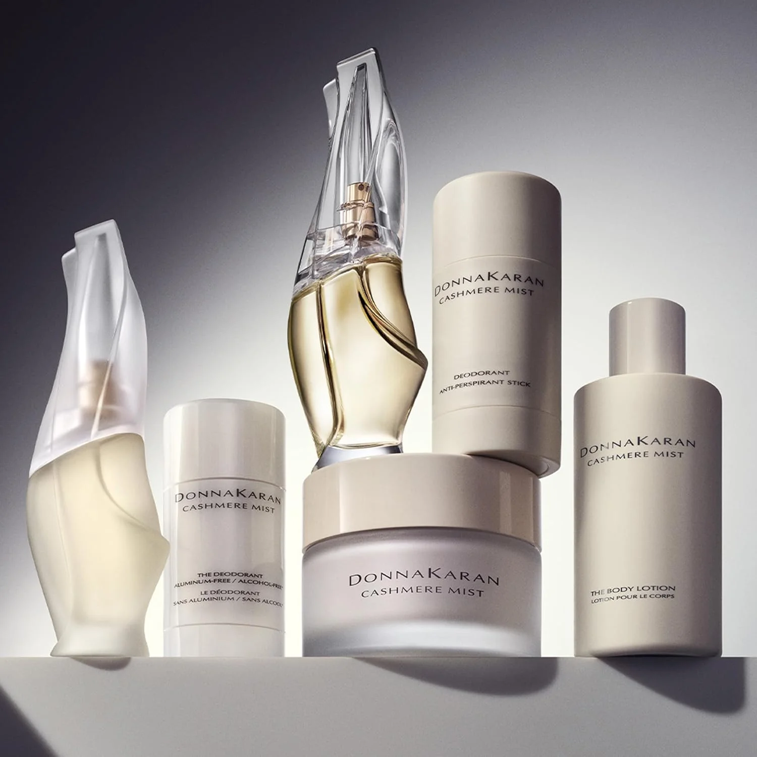 ست هدیه سه تکه زنانه دونا کاران Cashmere Mist Eau de Parfum Everything Cashmere - اسپری عطر 100 میلی لیتر، اسپری عطر مینی لوکس 5 میلی لیتر و لوسیون بدن 100 میلی لیتر
