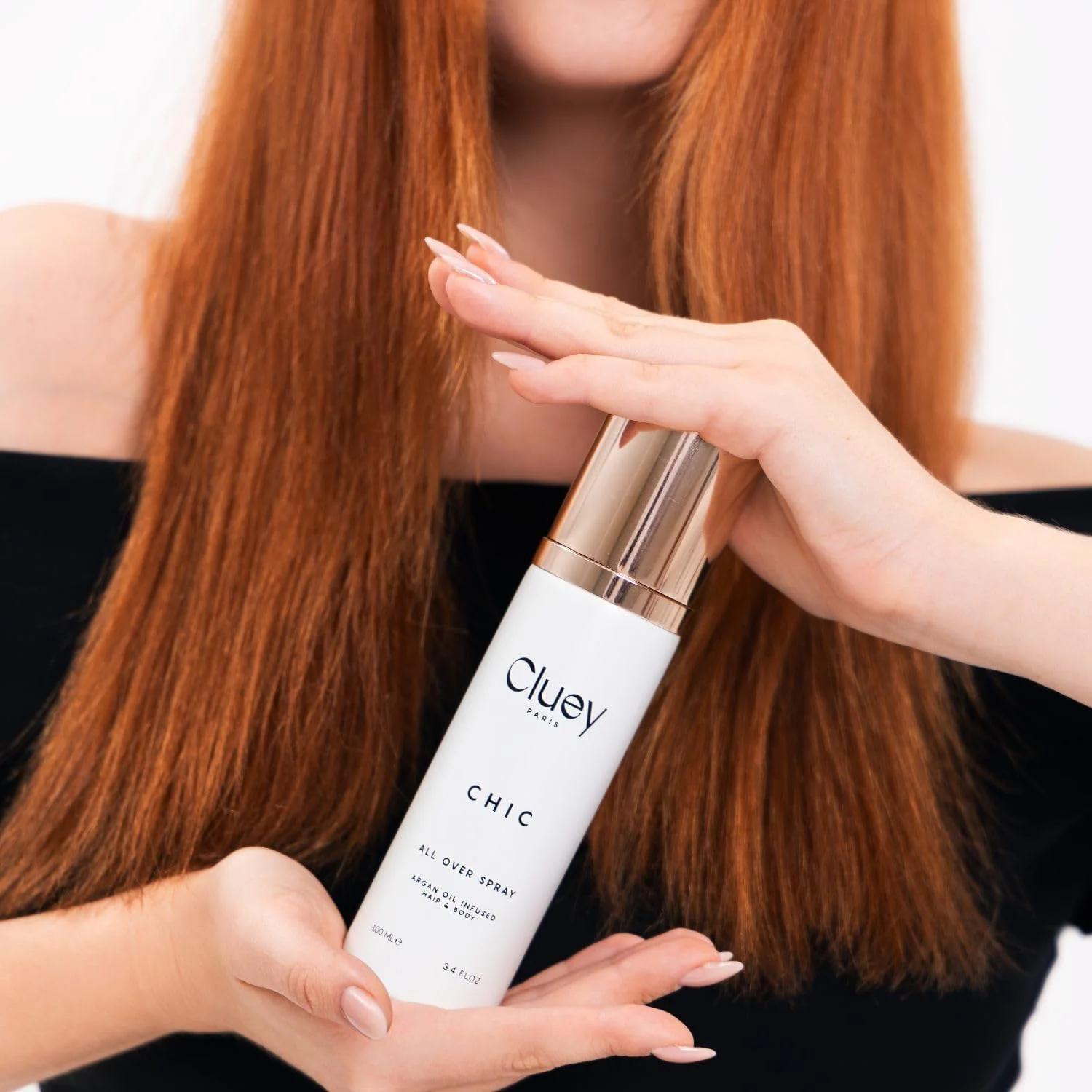 اسپری عطر مو و بدن Cluey CHIC حجم 100 میلی لیتر، غنی شده با روغن آرگان، اسپری کامل برای زنان و مردان با رایحه دودی نعناع هندی ترکیب شده با آکورد کهربا.