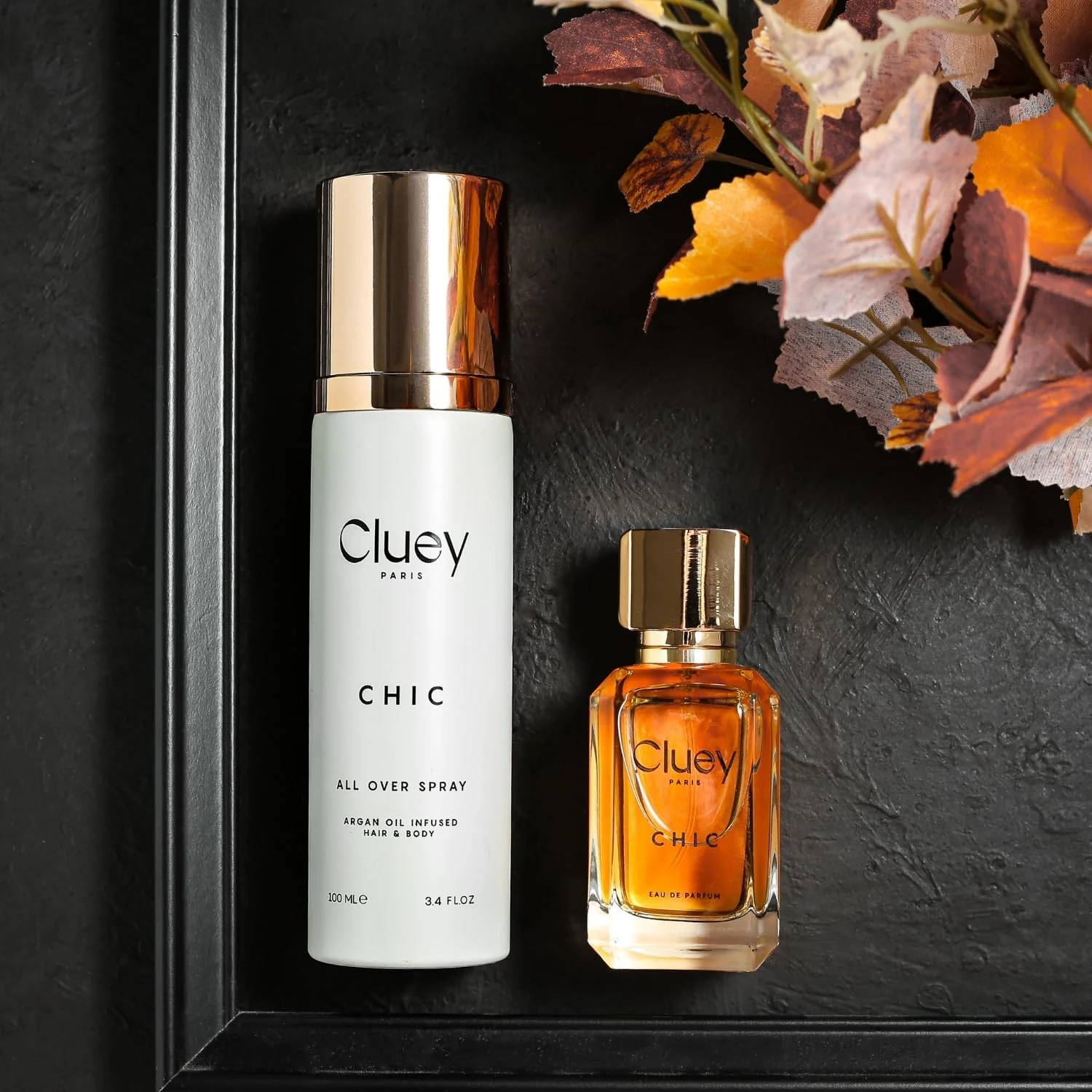 اسپری عطر مو و بدن Cluey CHIC حجم 100 میلی لیتر، غنی شده با روغن آرگان، اسپری کامل برای زنان و مردان با رایحه دودی نعناع هندی ترکیب شده با آکورد کهربا.