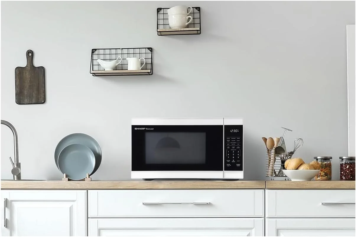 مایکروویو رومیزی SHARP با صفحه گردان کاروسل 12.4 اینچی قابل جابجایی، 1000 وات، 1.1 فوت مکعب، سفید مایکروویو رومیزی SHARP با صفحه گردان کاروسل 12.4 اینچی قابل جابجایی، 1000 وات، 1.1 فوت مکعب، سفید