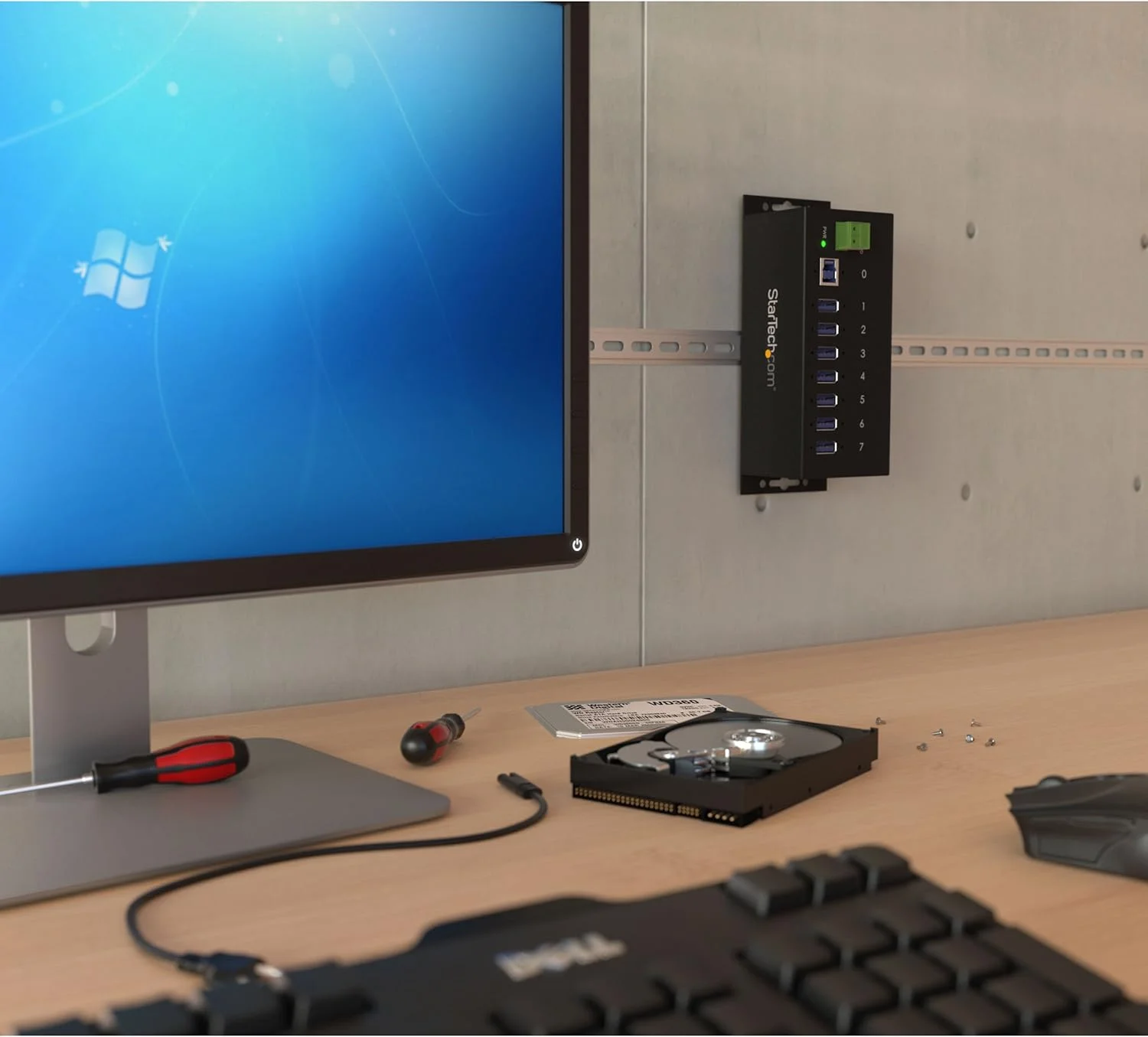 هاب USB 3.0 صنعتی 7 پورت StarTech.com با محافظ ESD و Surge 350W - هاب اسپلیتر توسعه دهنده پورت USB فلزی قابل نصب در رک (ST7300USBME)