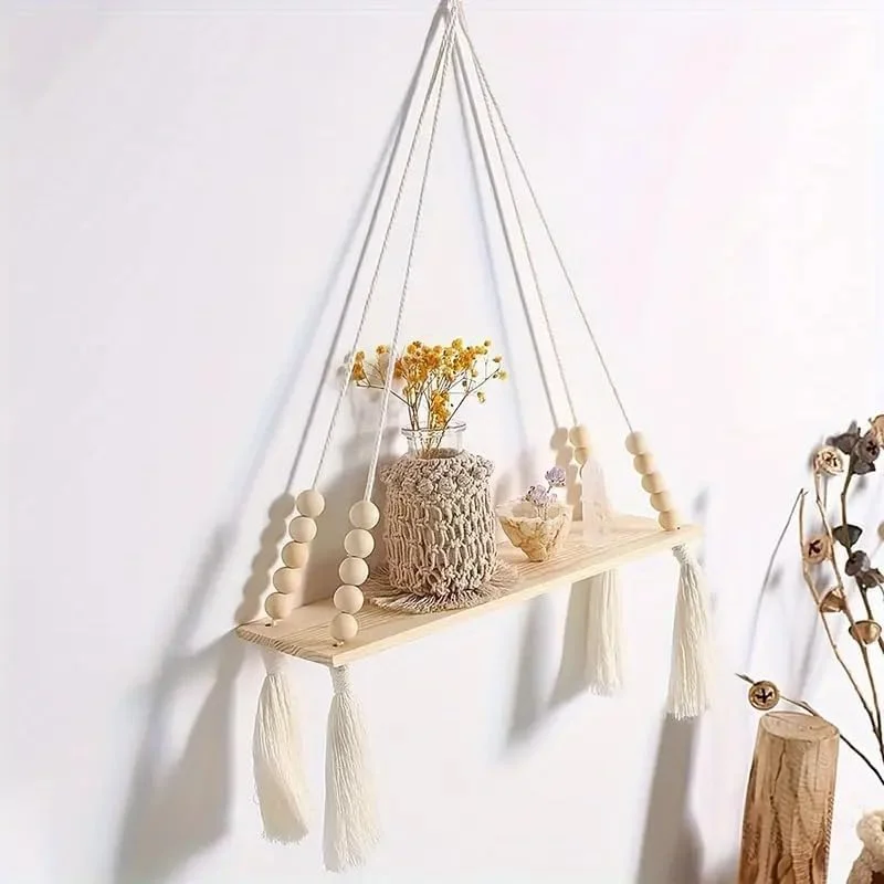 شلف آویز مکرومه با مهره های چوبی و منگوله، قفسه دیواری کوچک بوهمی، قفسه ذخیره سازی روستایی نصب شده روی دیوار برای اتاق خواب، حمام، گیاهان، گلدان ها، قفسه نمایشگر، دکوراسیون منزل شلف آویز مکرومه با مهره های چوبی و منگوله، قفسه دیواری کوچک بوهمی، قفسه ذخیره سازی روستایی نصب شده روی دیوار برای اتاق خواب، حمام، گیاهان، گلدان ها، قفسه نمایشگر، دکوراسیون منزل