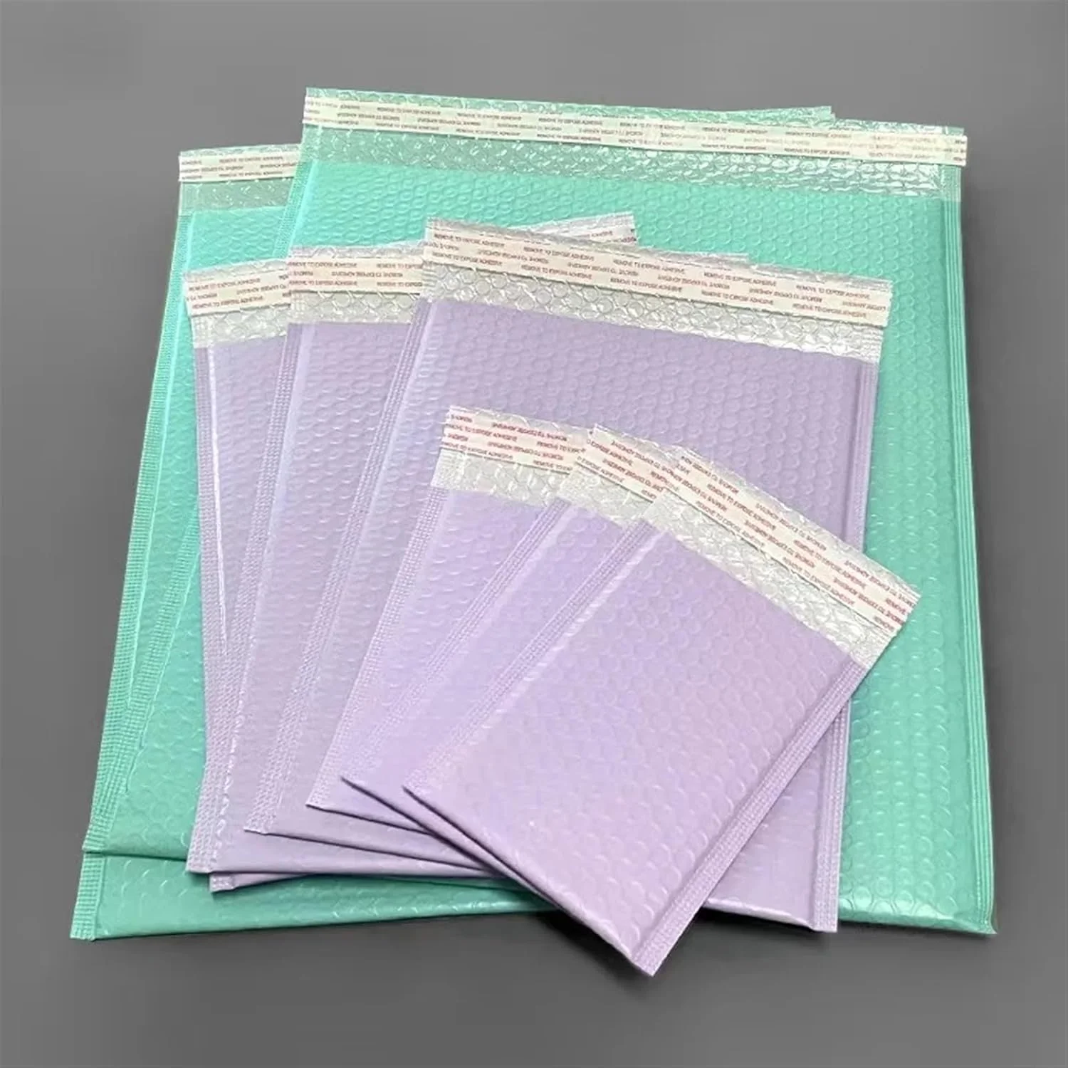 بسته 50 عددی پاکت حبابدار بنفش/کیسه بسته بندی رنگارنگ خود چسب دار پاکت پر شده بسته بندی حمل و نقل (رنگ: B، اندازه: 15 * 20 سانتی متر)