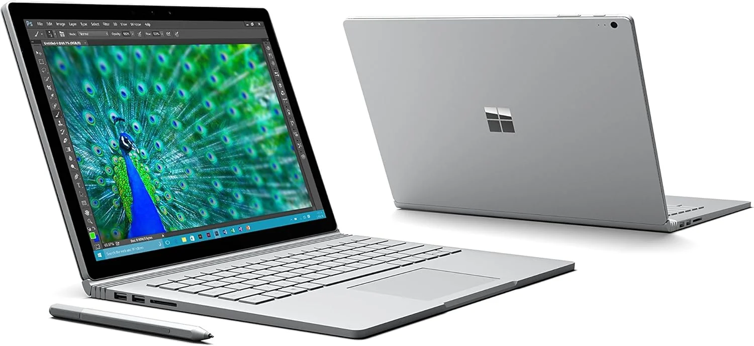 لپ تاپ لمسی 13.5 اینچی Microsoft Surface Book (پردازنده Intel Core i7-6600U، 8 گیگابایت رم، 256 گیگابایت SSD، گرافیک یکپارچه NVIDIA 1 گیگابایتی، BT4/AC، Wi-Fi، لمسی، Windows 10 Pro) - نقره ای