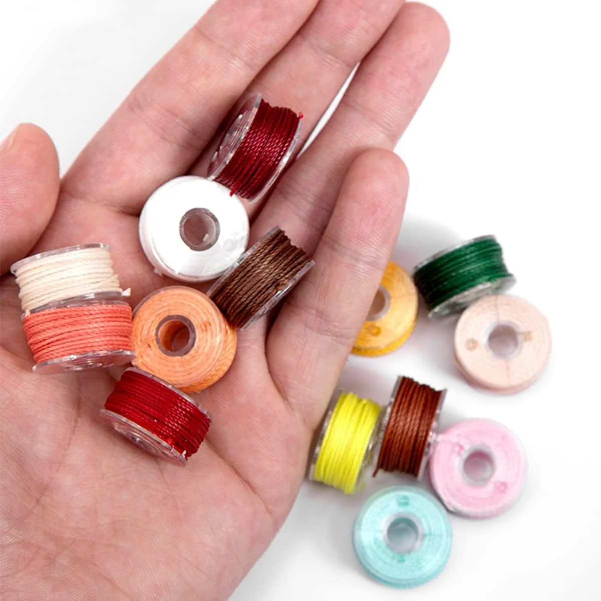 نخ قرقره از پیش پیچیده WUTA در 25 رنگ، نخ قرقره مینی، نخ دوخت چرم دست ساز DIY، طناب بافته شده، خط دستبند برای گلدوزی و خیاطی (0.55 میلی متر)